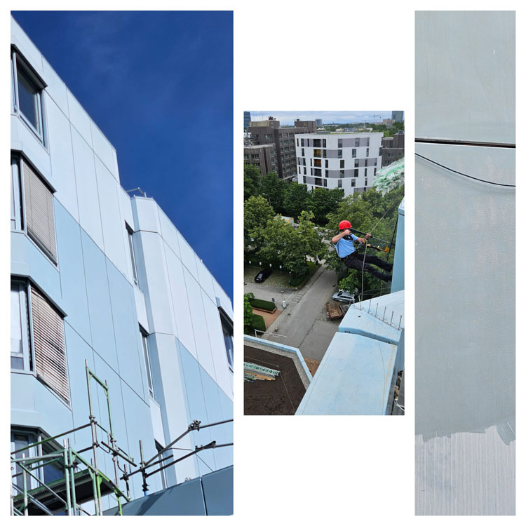Fassadenreinigung am Seil an einer hellen Fassade